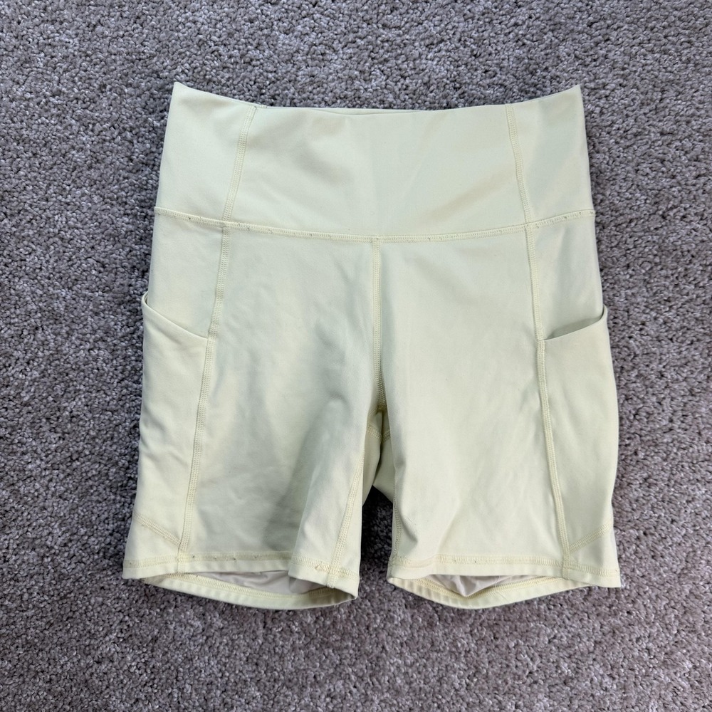Fabletics Bike Shorts Womens Small Yellow PureLuxe High Rise 6" Inseam Pockets